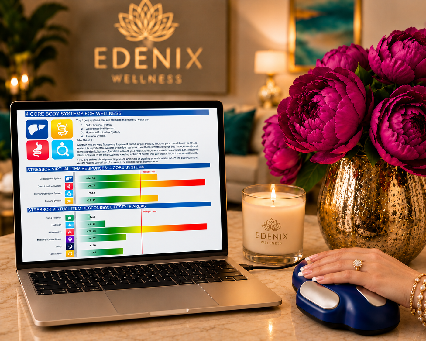 A laptop displaying an Edenix bioenergetic wellness scan report, with a hand resting on the bioenergetic scan device beside a lit Edenix candle and peonies